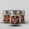 Multiple jars of Shree Girraj Traders Silver Hing showing pure asafoetida packaging for home kitchens